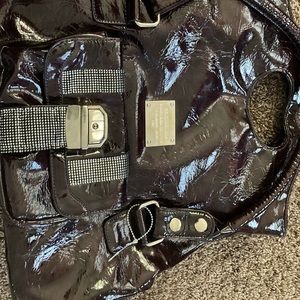 Selling a purse, color is dark purple it’s leather